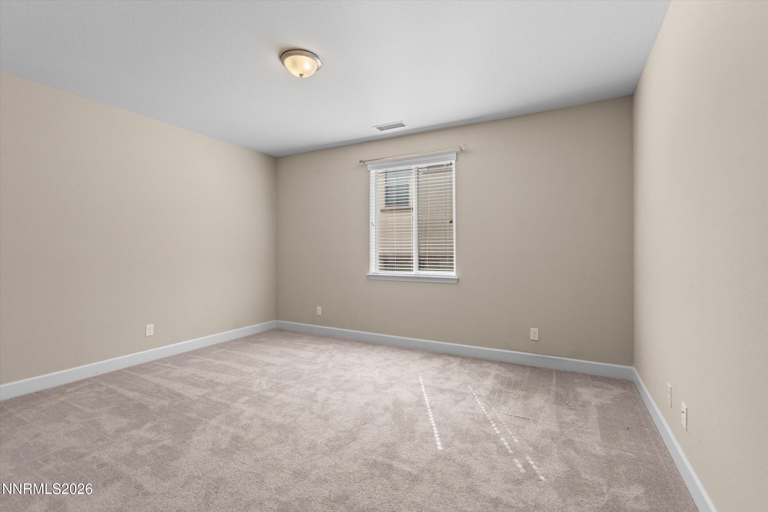 1725 Verdi Vista Court Reno, NV 89523 - Photo 21 of 37 an empty room with windows
