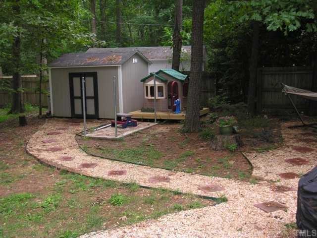 1400 Seaton Road Durham, NC 27713 - Photo 10 of 12 a front view of a house with garden