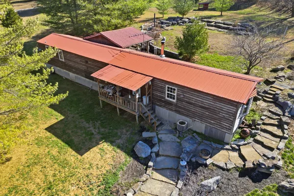a aerial view of a yard with swimming pool
