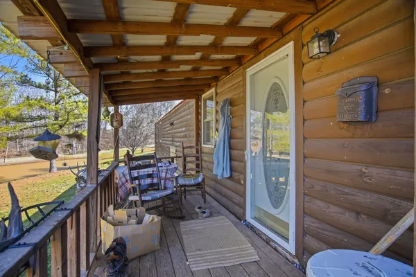 a view of a chairs and tables in the patio