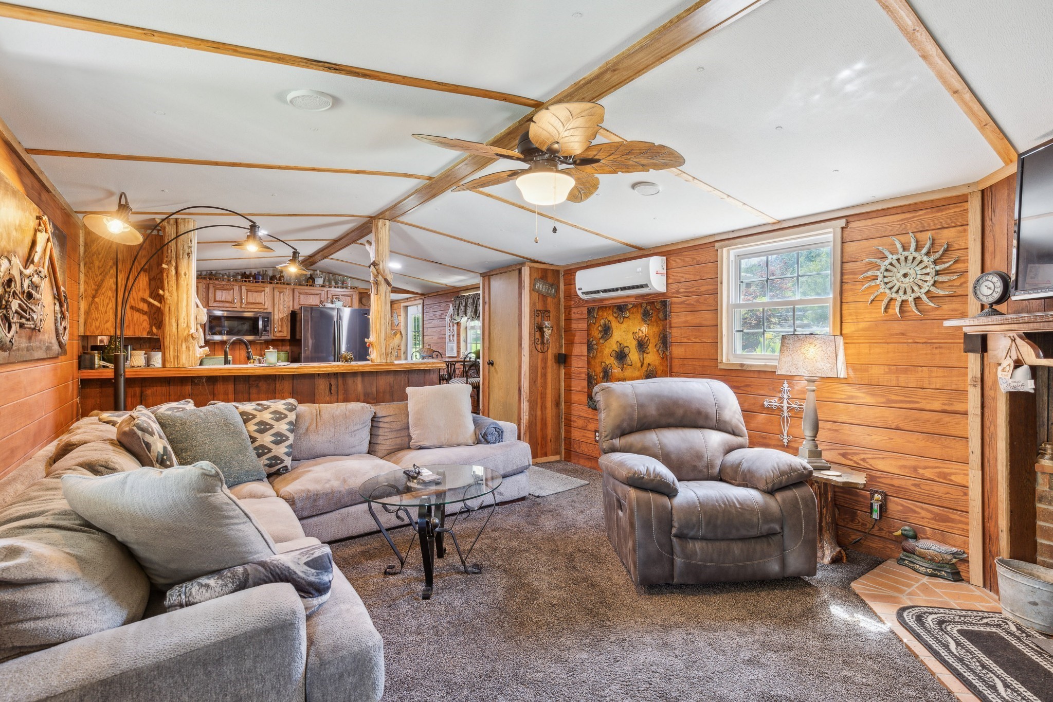 3611 Cooper Nicholson Road Pleasant View, TN 37146 - Photo 24 of 60 a living room with furniture a ceiling fan and a rug