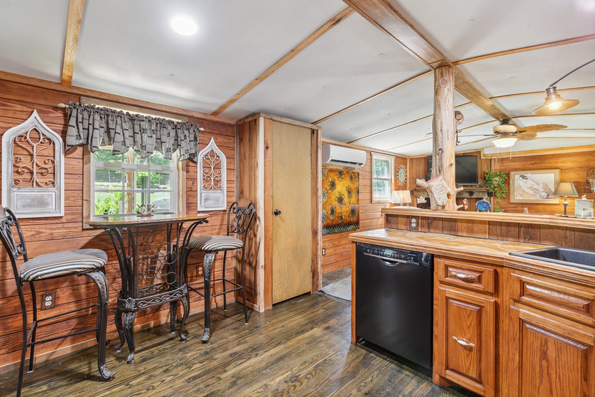 3611 Cooper Nicholson Road Pleasant View, TN 37146 - Photo 27 of 60 a kitchen with stainless steel appliances granite countertop wooden floors and white cabinets