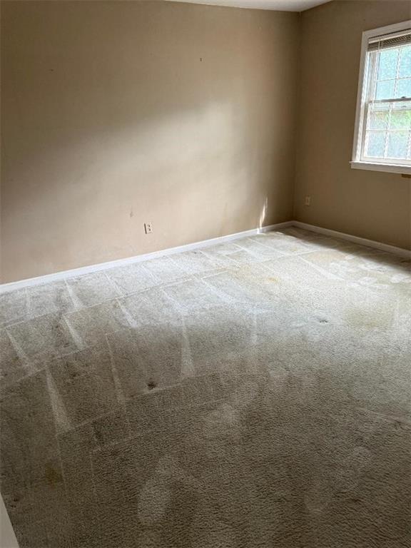29 Chaumont Square Northwest Atlanta, GA 30327 - Photo 11 of 16 an empty room with a window