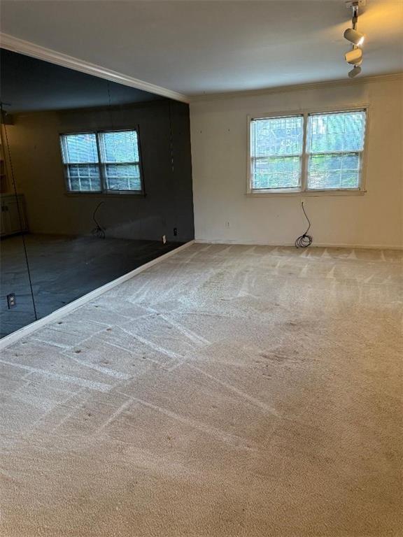 29 Chaumont Square Northwest Atlanta, GA 30327 - Photo 3 of 16 an empty room with a empty space and windows