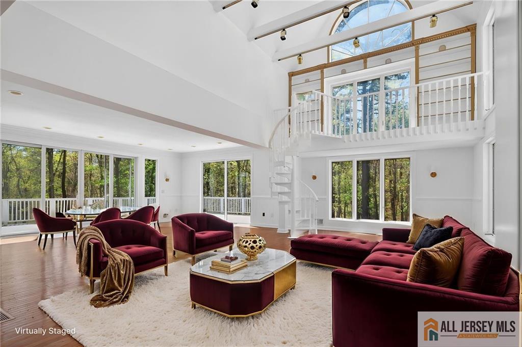 381 Monmouth Road Freehold, NJ 07728 - Photo 60 of 63 a living room with furniture and a large window