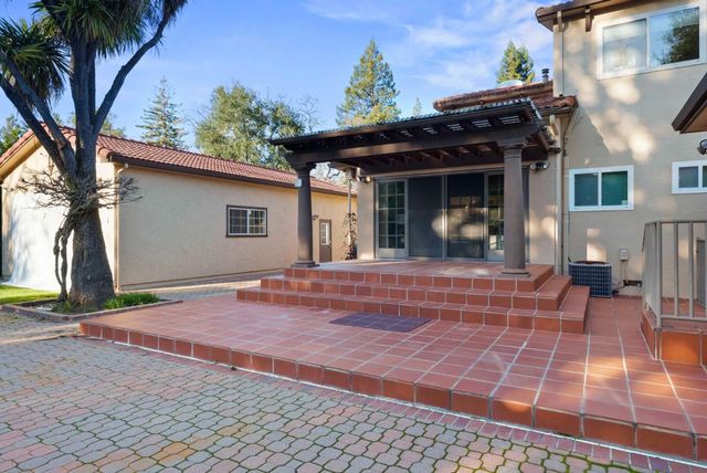 a view of a house with a patio