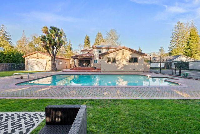 a view of yard with outdoor seating
