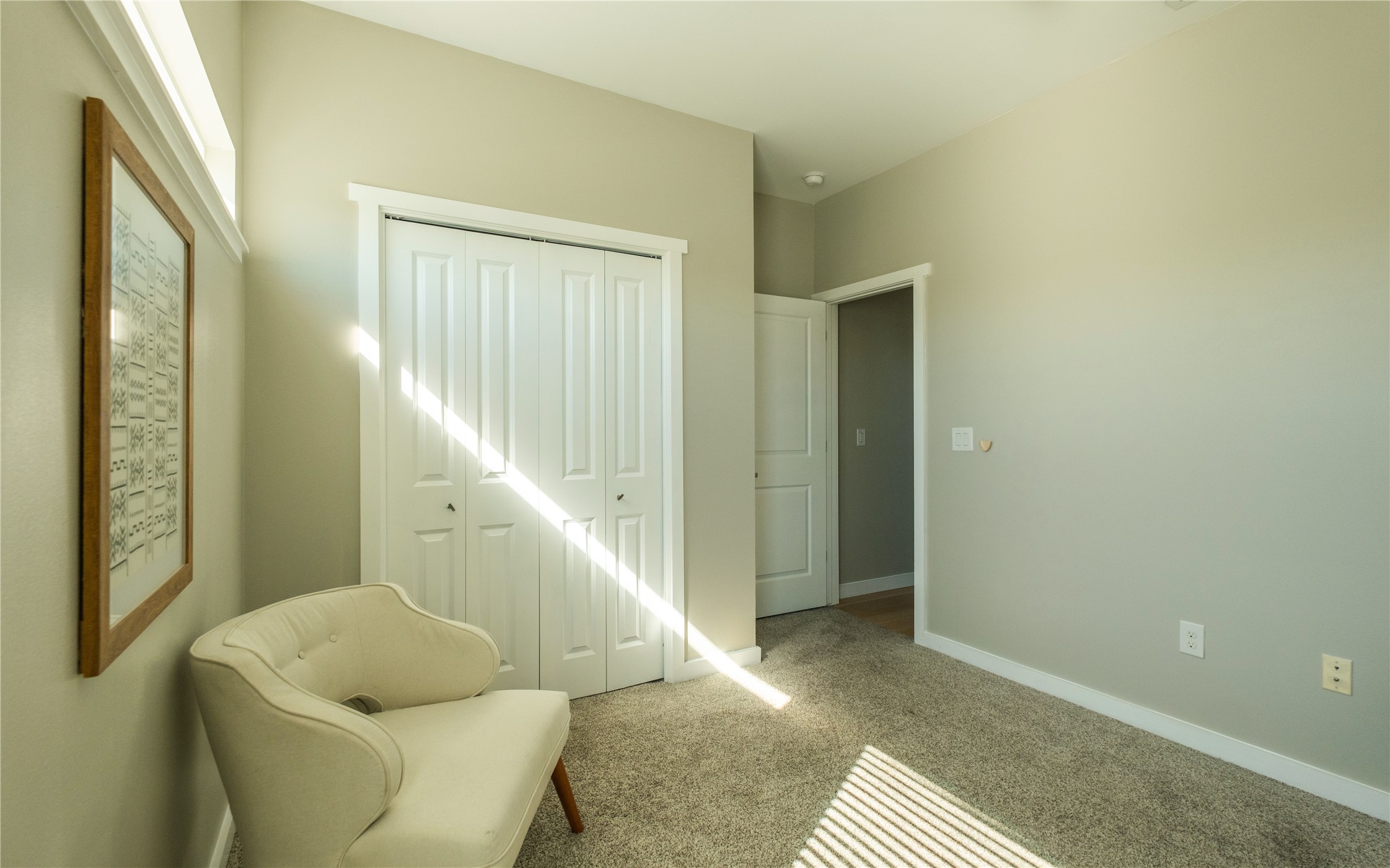 7601 Bethune Avenue, Unit B Austin, TX 78752 - Photo 21 of 39 Living area featuring carpet and baseboards
