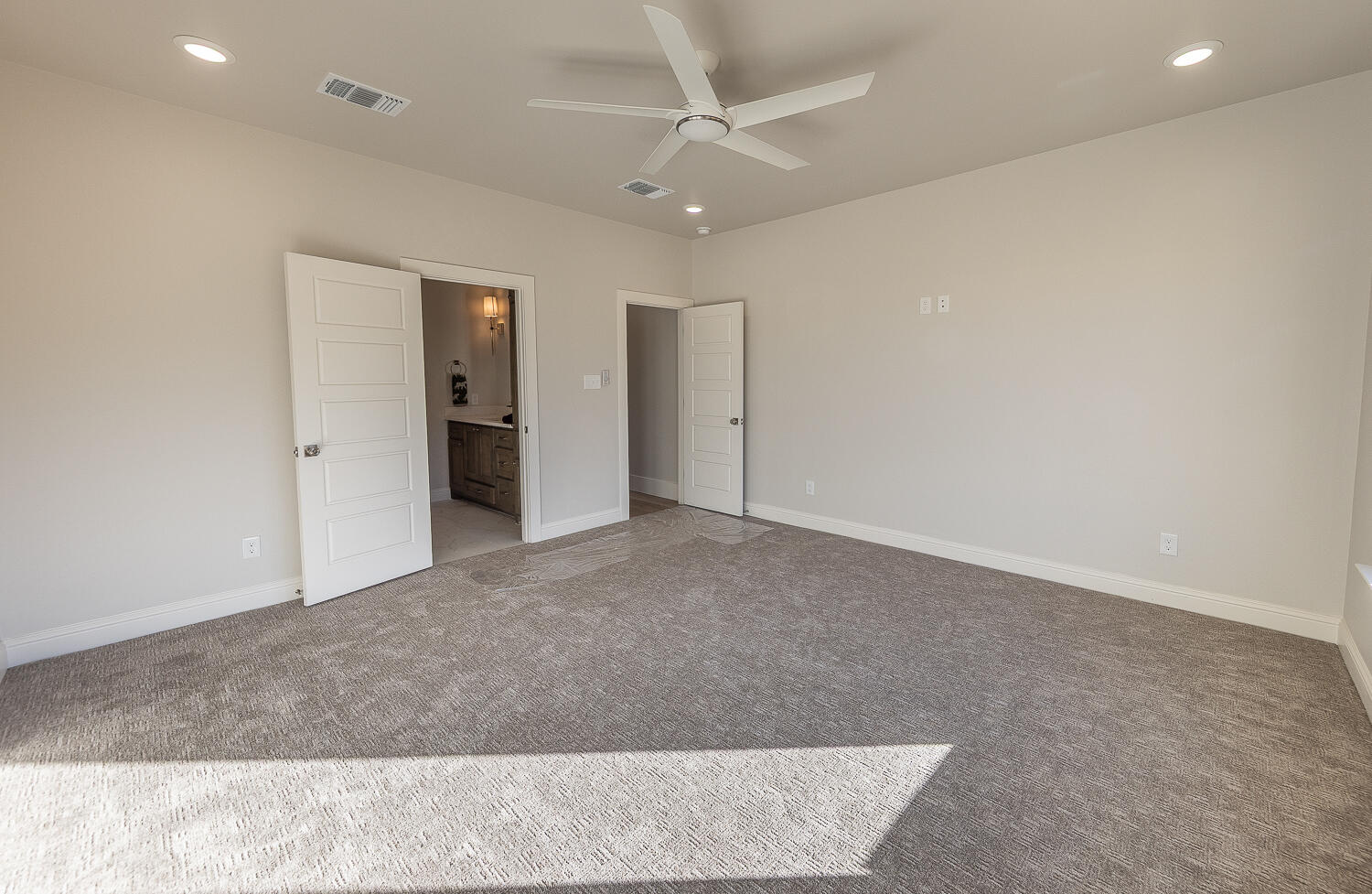3607 143rd Street Lubbock, TX 79423 - Photo 17 of 35 an empty room with fan and a ceiling fan