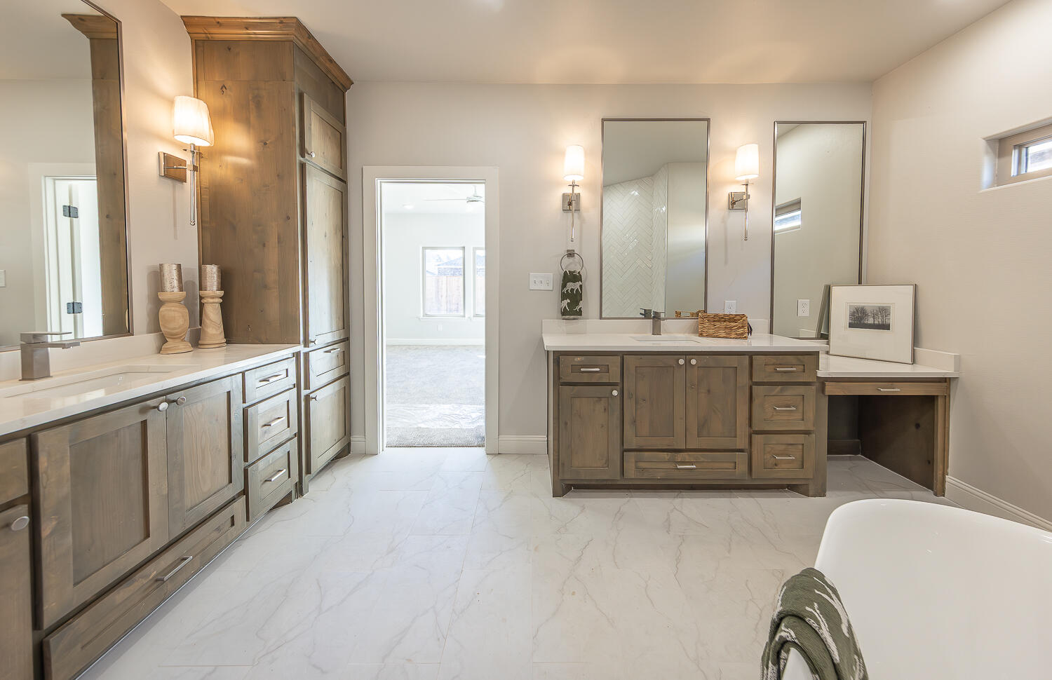 3607 143rd Street Lubbock, TX 79423 - Photo 21 of 35 a spacious bathroom with a double vanity sink mirror and