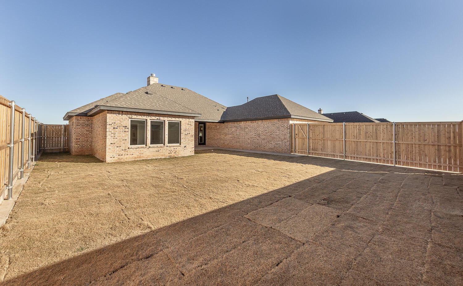 3607 143rd Street Lubbock, TX 79423 - Photo 32 of 35 a front view of a house with a yard