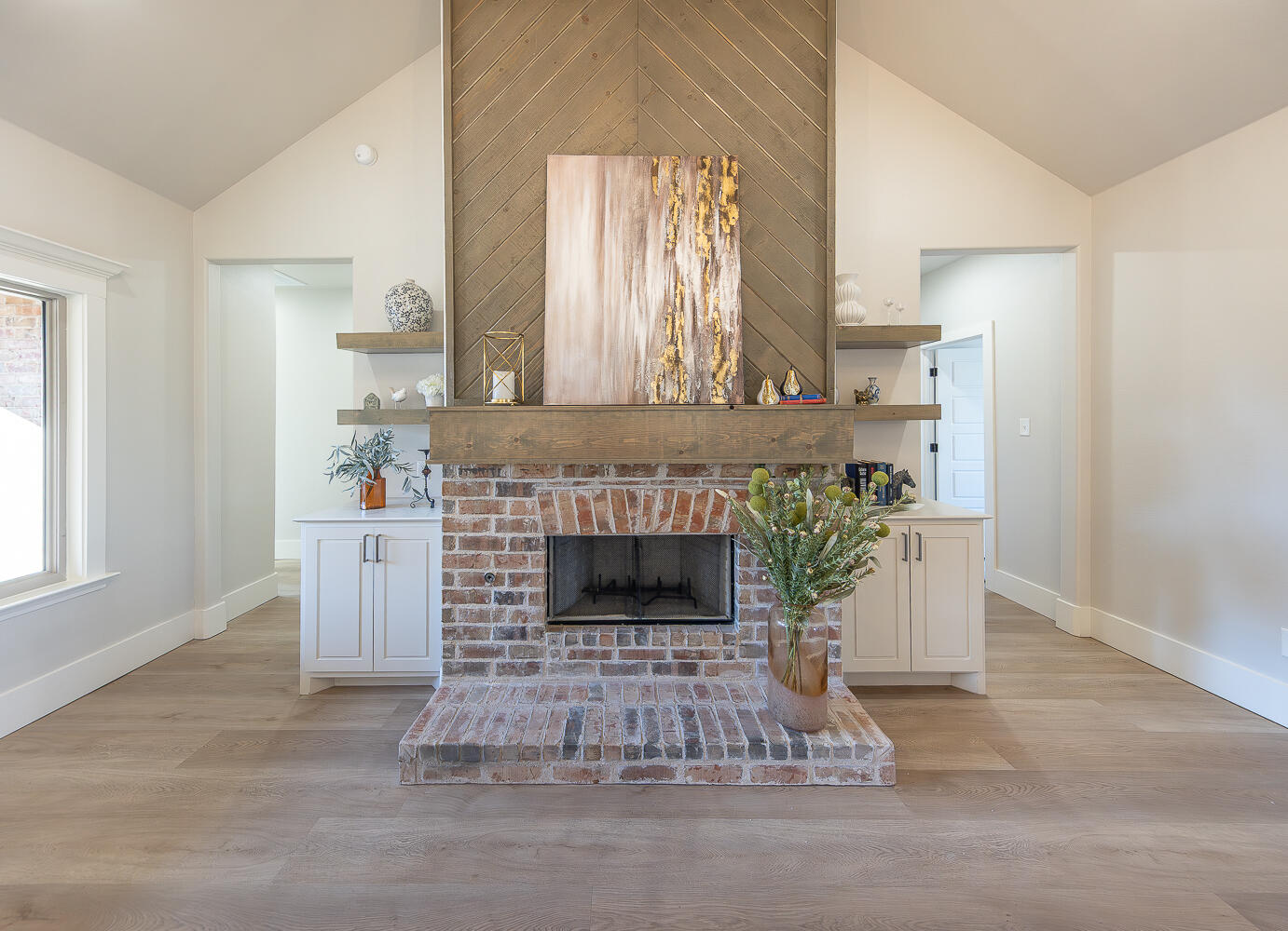 3607 143rd Street Lubbock, TX 79423 - Photo 6 of 35 a living room with furniture and a fireplace