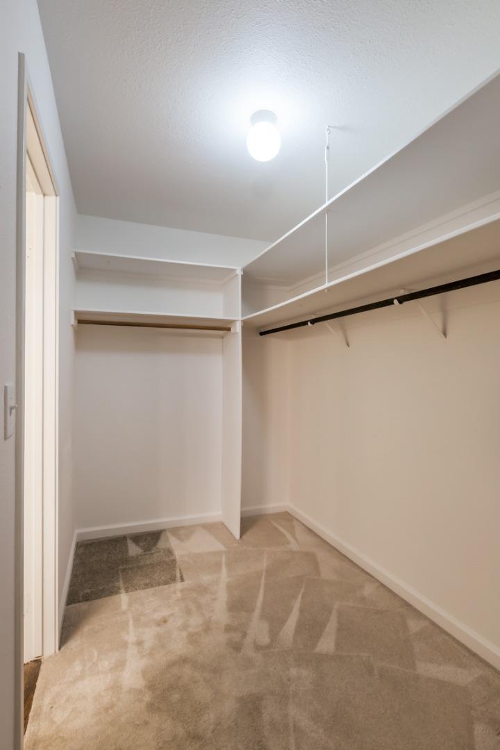 57 Pearce Mitchell Place Stanford, CA 94305 - Photo 12 of 13 an empty room with a empty space and windows