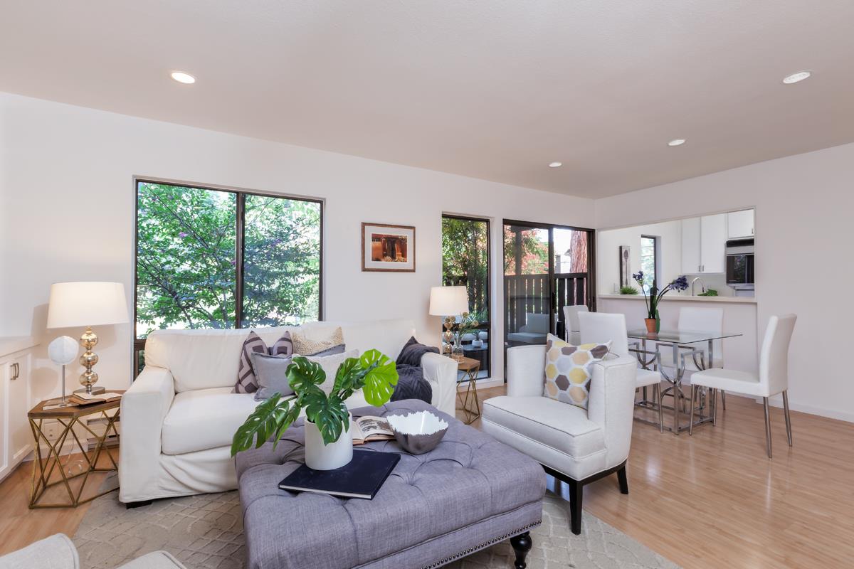 57 Pearce Mitchell Place Stanford, CA 94305 - Photo 5 of 13 a living room with furniture and a potted plant