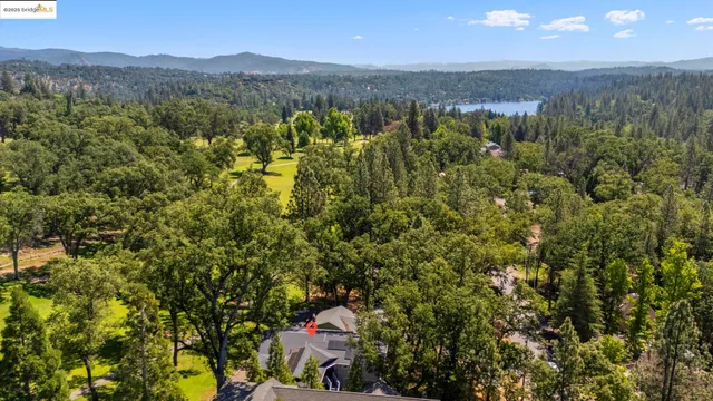 a view of a city with mountains in the background