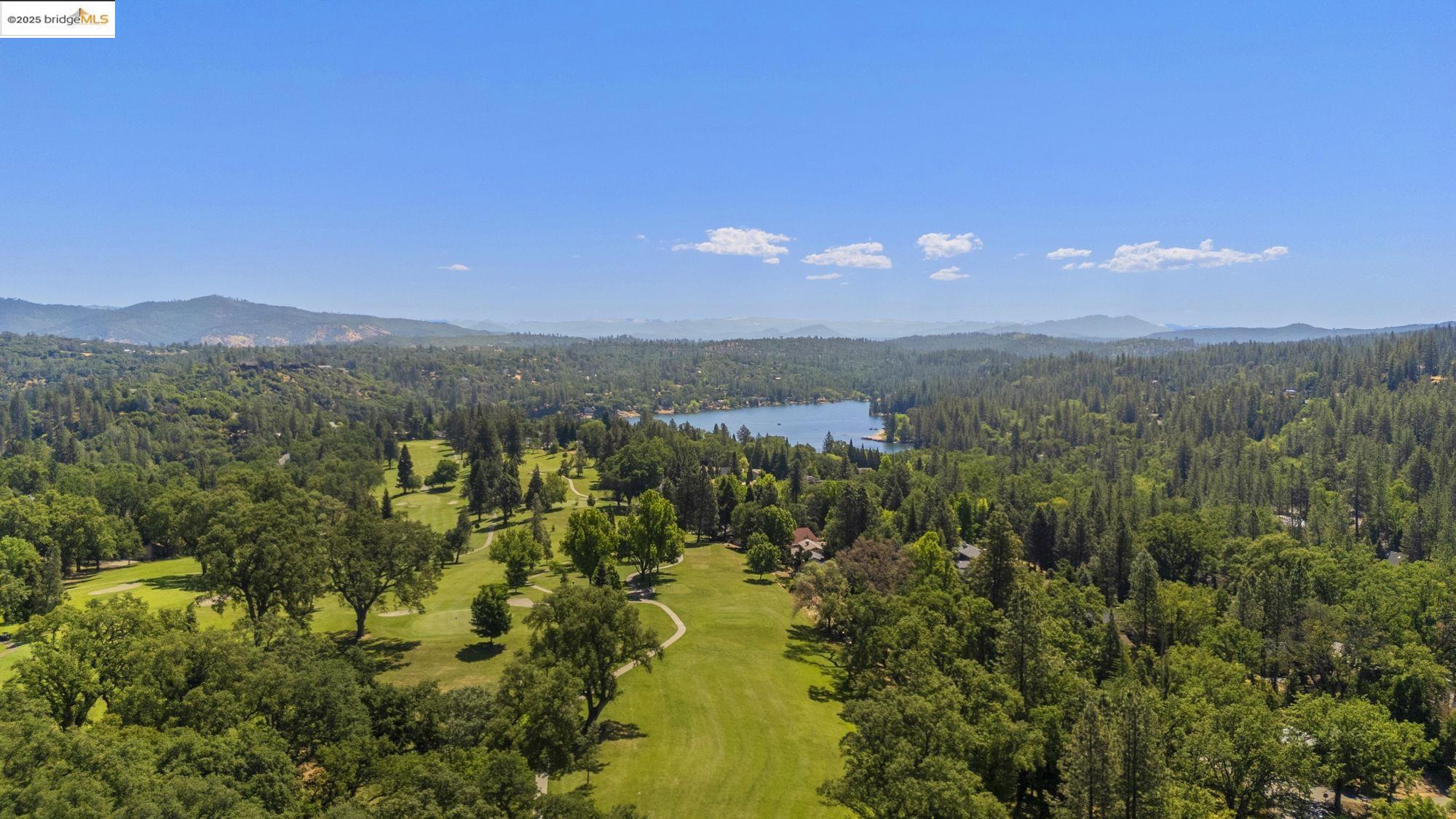 19400 Reid Circle Groveland, CA 95321 - Photo 13 of 60 a view of a lake in middle of the forest