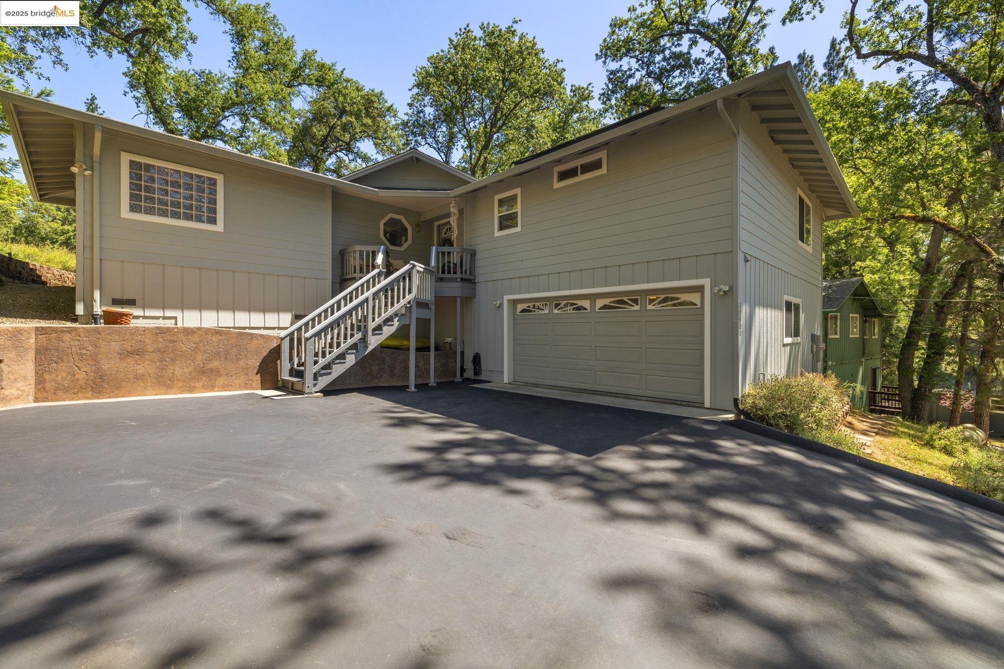 19400 Reid Circle Groveland, CA 95321 - Photo 19 of 60 a view of a house with a yard and tree