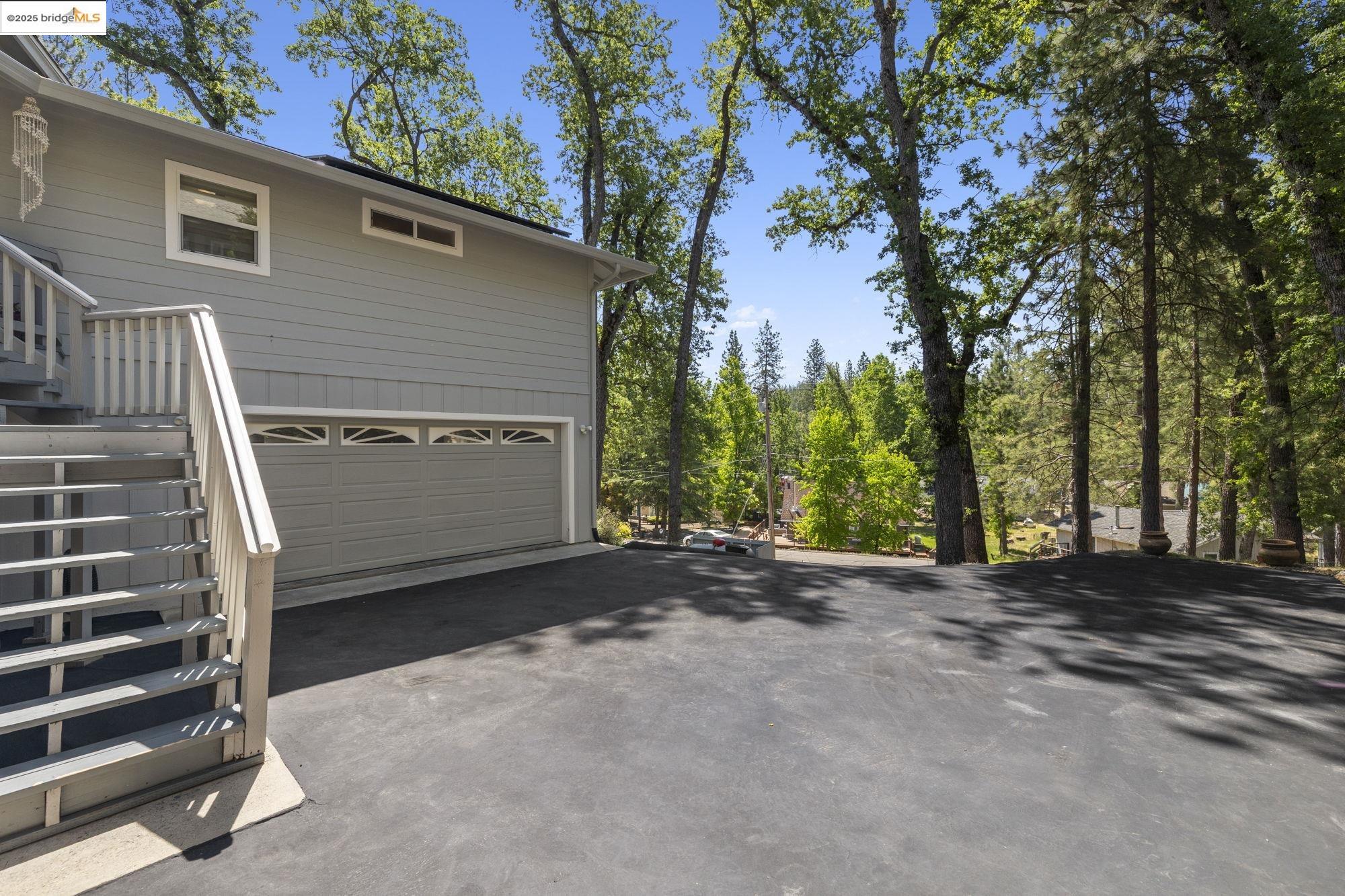 19400 Reid Circle Groveland, CA 95321 - Photo 20 of 60 a view of a house with a garage