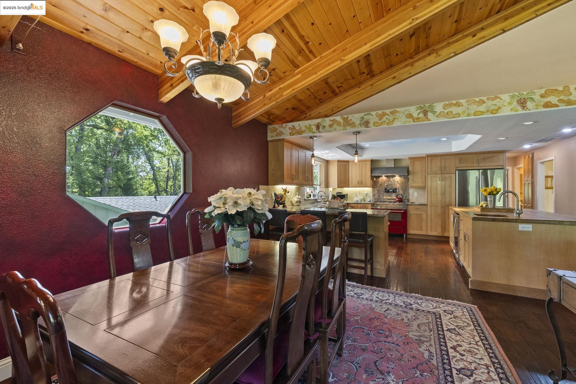 19400 Reid Circle Groveland, CA 95321 - Photo 28 of 60 a view of a dining room with furniture window and wooden floor