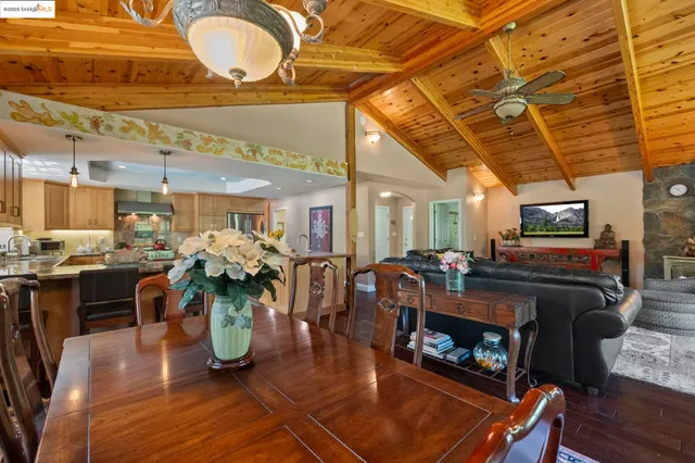 a kitchen with stainless steel appliances granite countertop a stove and cabinets