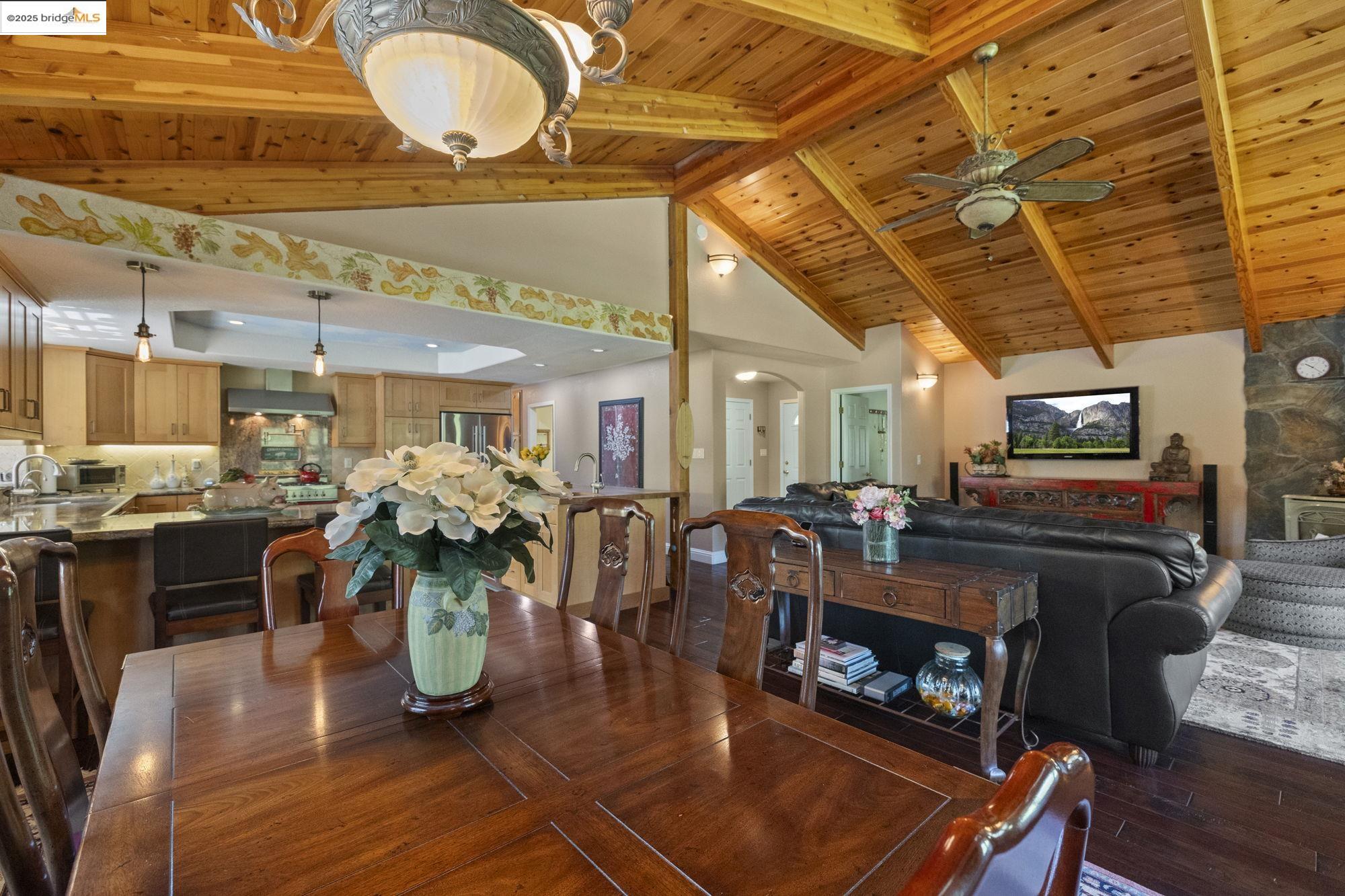 19400 Reid Circle Groveland, CA 95321 - Photo 29 of 60 a living room with furniture a flat screen tv and a fireplace