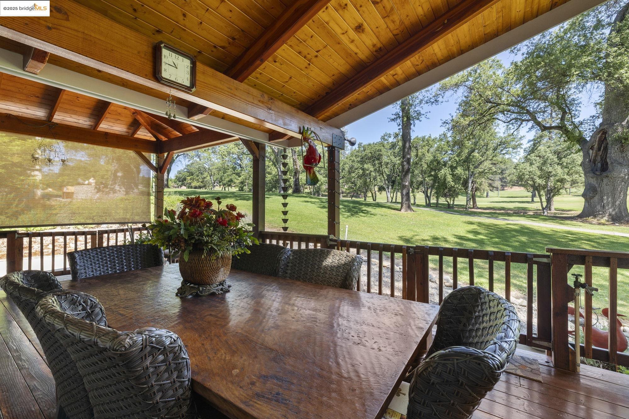 19400 Reid Circle Groveland, CA 95321 - Photo 3 of 60 a living room with patio furniture and a floor to ceiling window