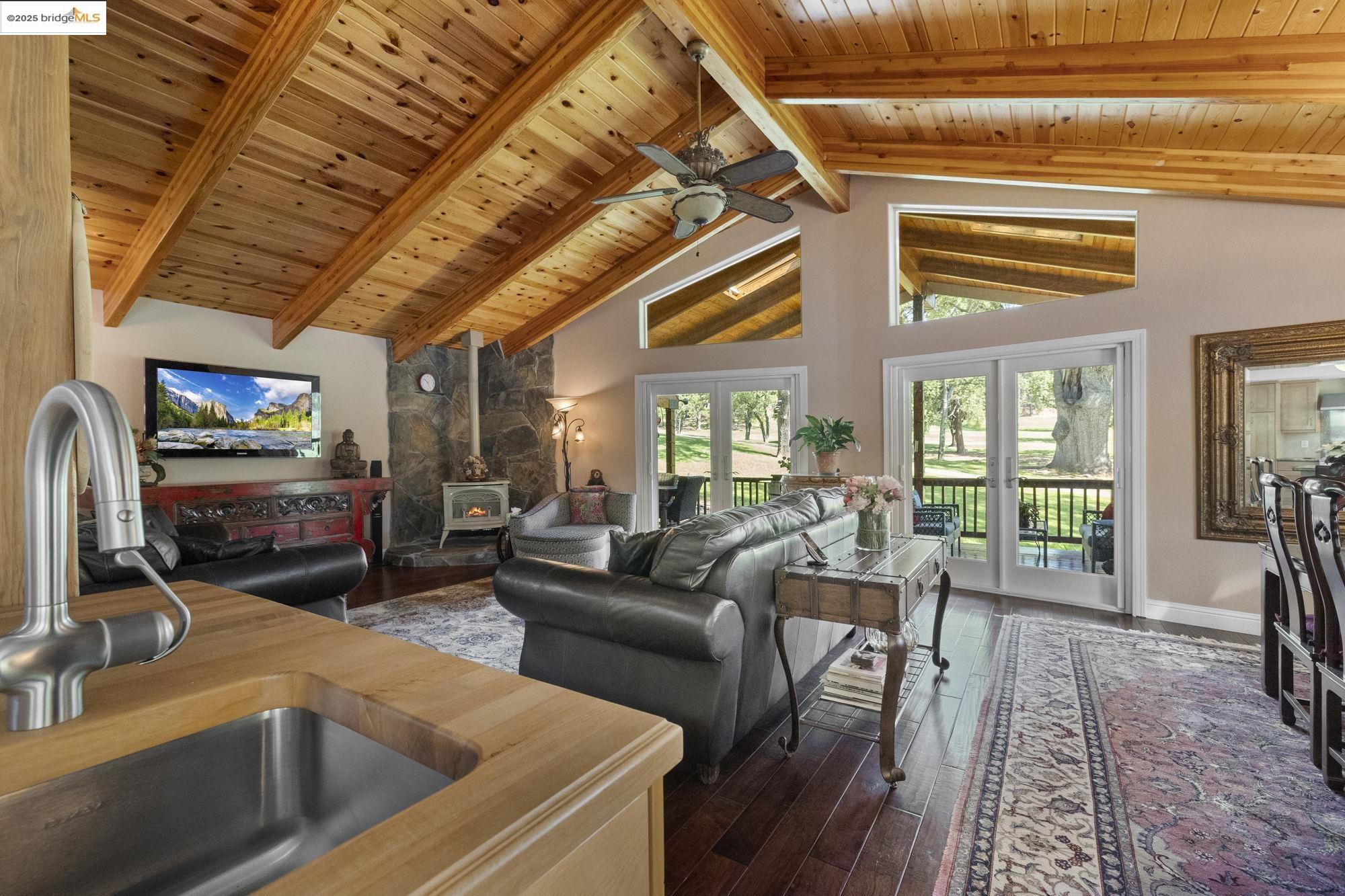 19400 Reid Circle Groveland, CA 95321 - Photo 31 of 60 a living room with furniture and a flat screen tv