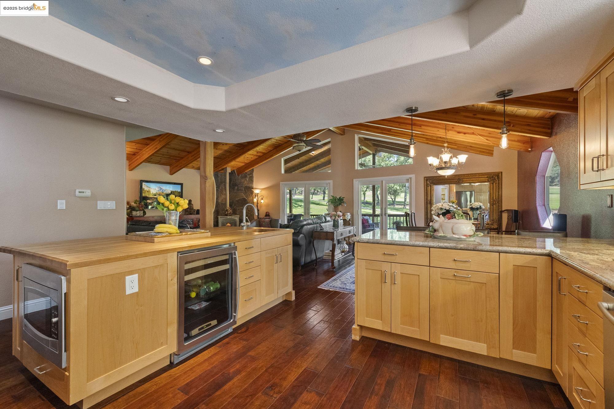 19400 Reid Circle Groveland, CA 95321 - Photo 34 of 60 a kitchen with stainless steel appliances granite countertop a stove and cabinets