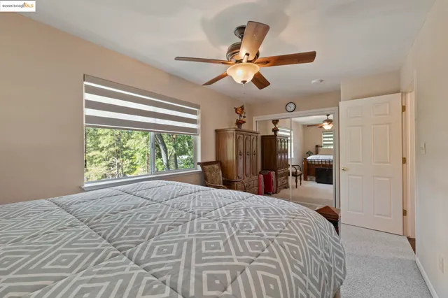 an aerial view of a house with a lake view