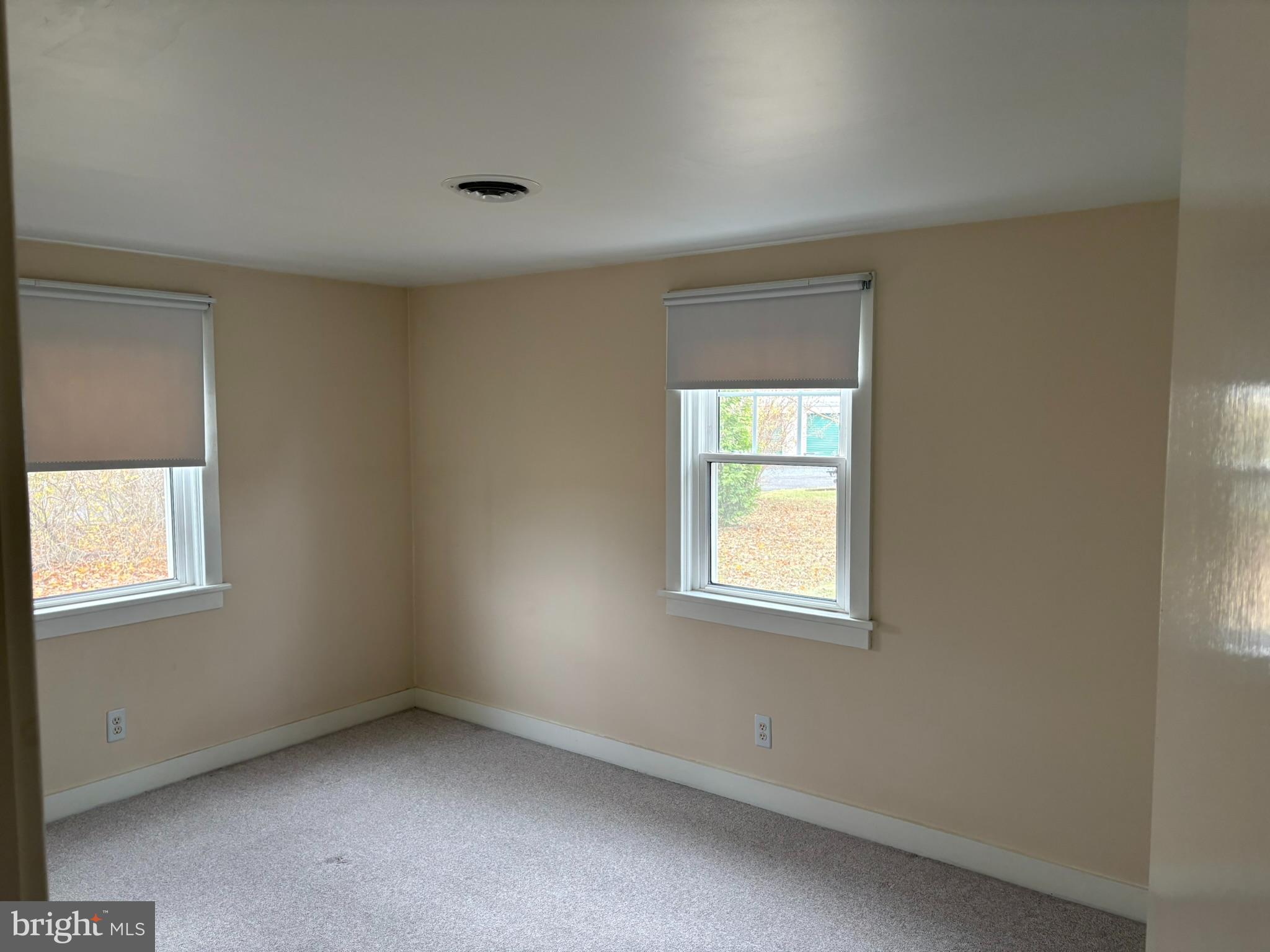 3842 Old Easton Road Doylestown, PA 18902 - Photo 5 of 13 an empty room with a window