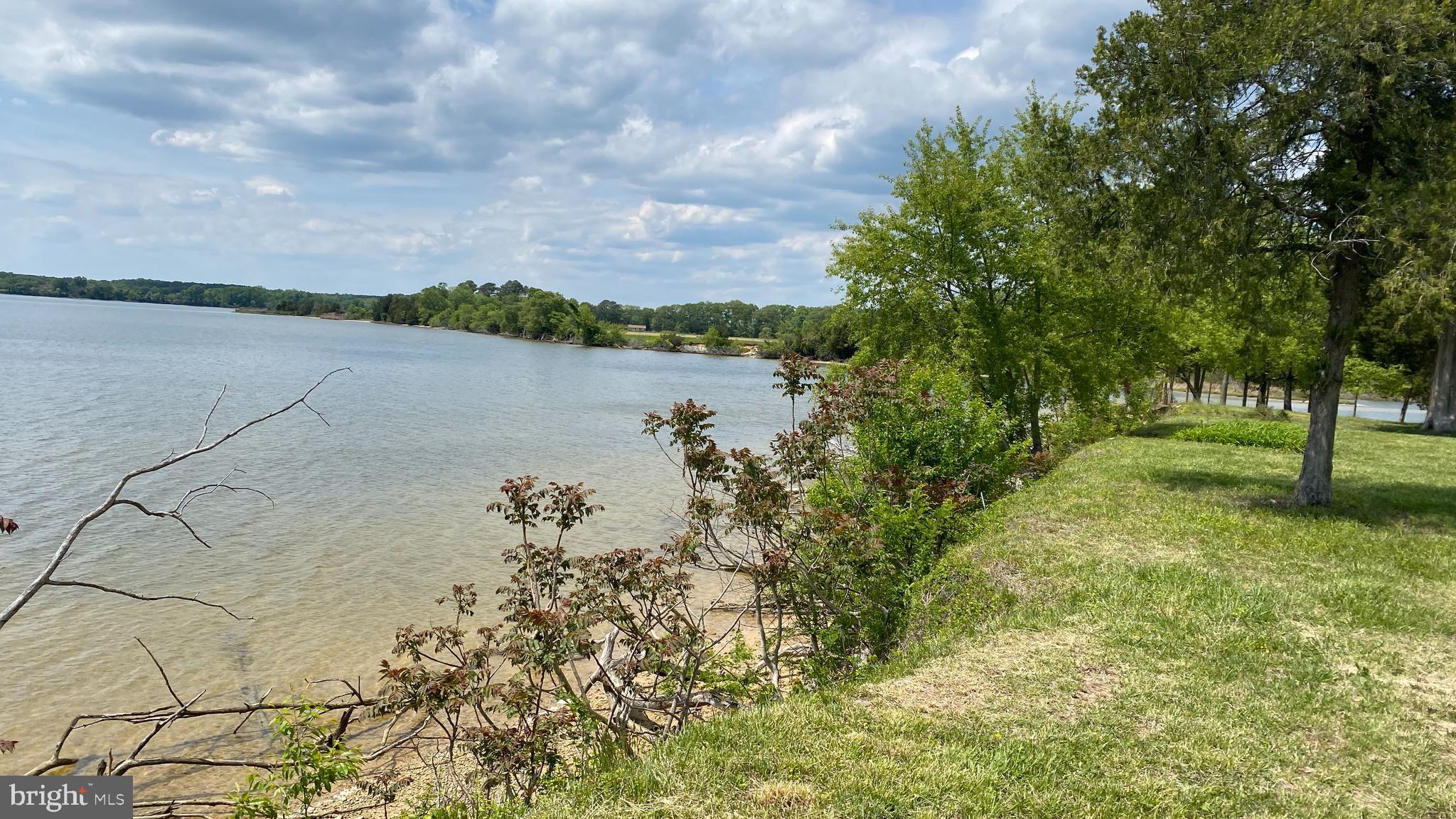 39645 Sweetpea Lane Leonardtown, MD 20650 - Photo 13 of 66 a view of a lake with a garden