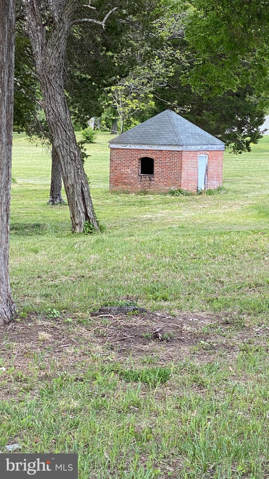 39645 Sweetpea Lane Leonardtown, MD 20650 - Photo 26 of 66 a front view of a house with garden