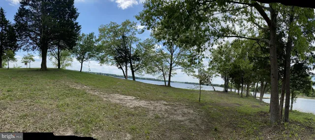 a aerial view of a house with a yard