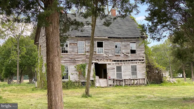 a view of a wooden floor with a lake view
