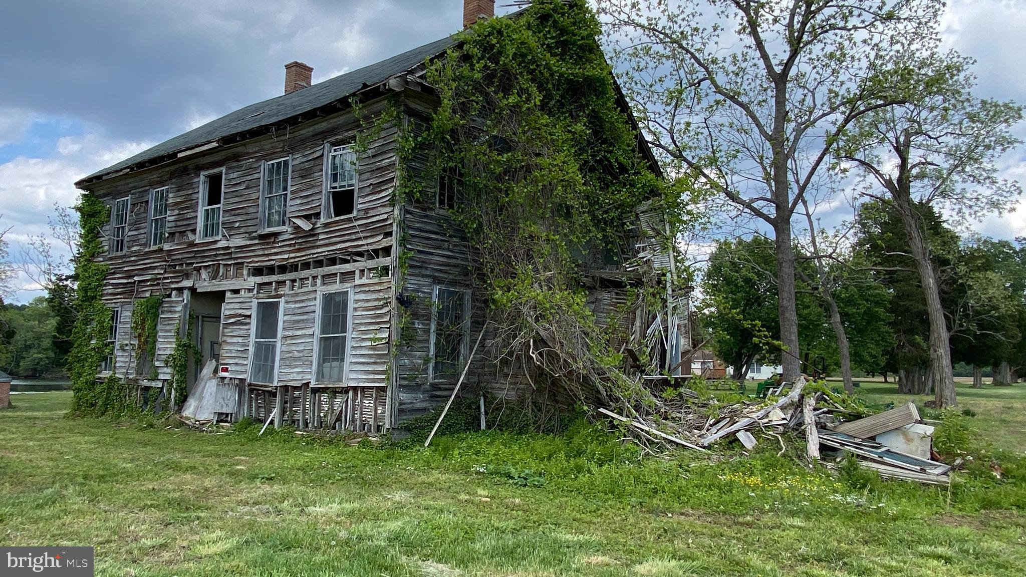 39645 Sweetpea Lane Leonardtown, MD 20650 - Photo 38 of 66 a backyard of a house with entertaining space