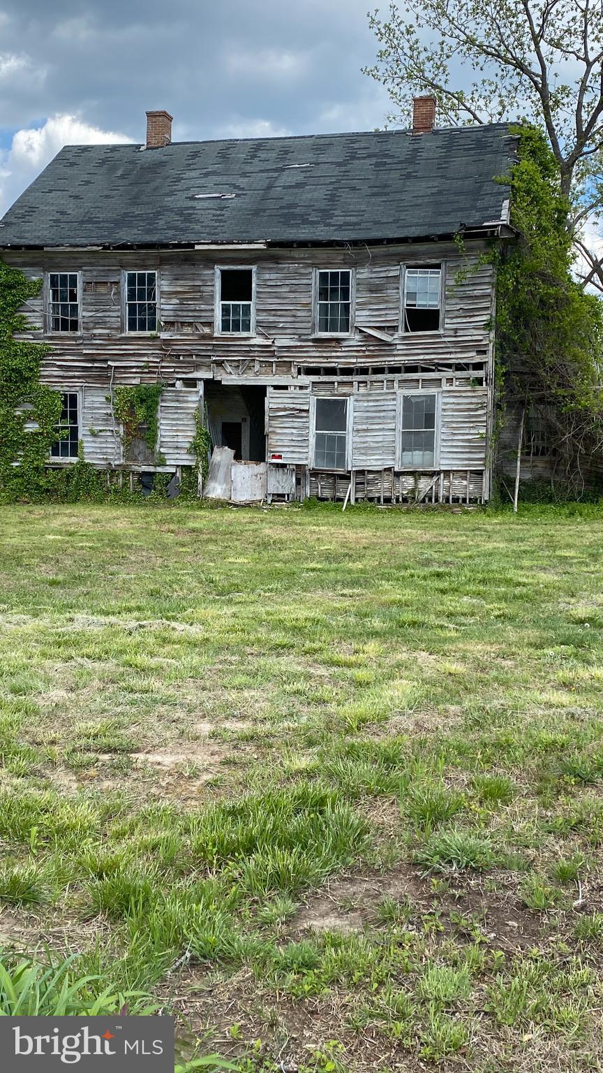 39645 Sweetpea Lane Leonardtown, MD 20650 - Photo 39 of 66 a front view of a house with a yard