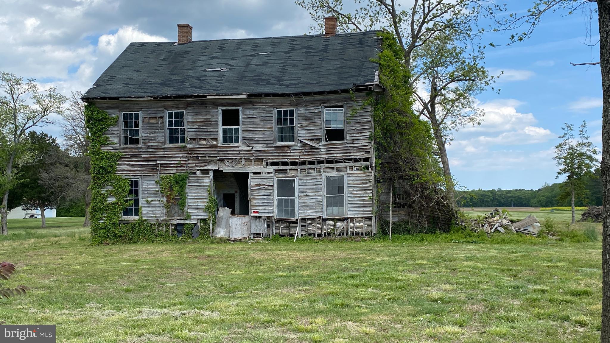39645 Sweetpea Lane Leonardtown, MD 20650 - Photo 43 of 66 a front view of a house with garden