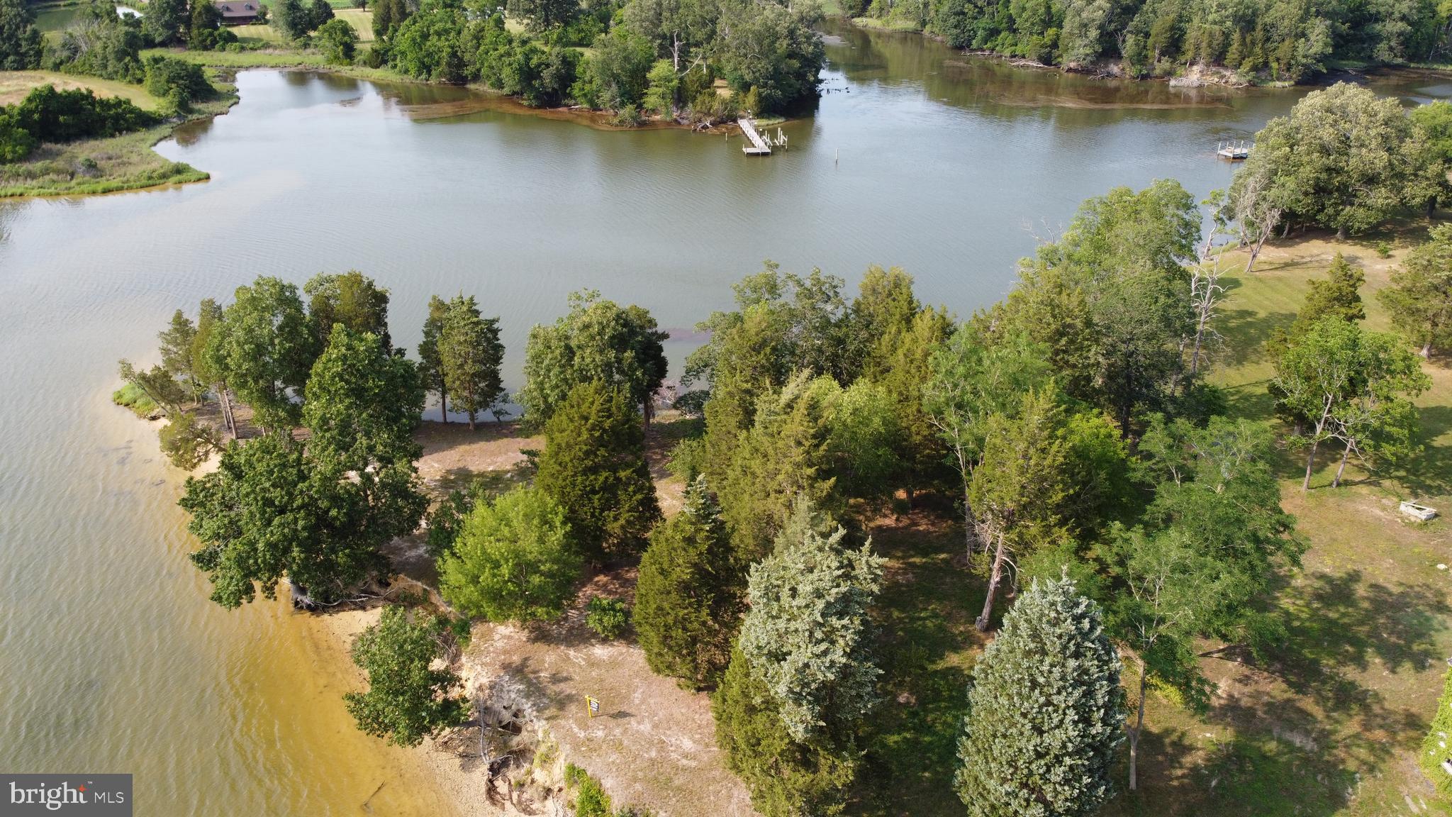 39645 Sweetpea Lane Leonardtown, MD 20650 - Photo 50 of 66 an aerial view of lake residential house with outdoor space and trees around