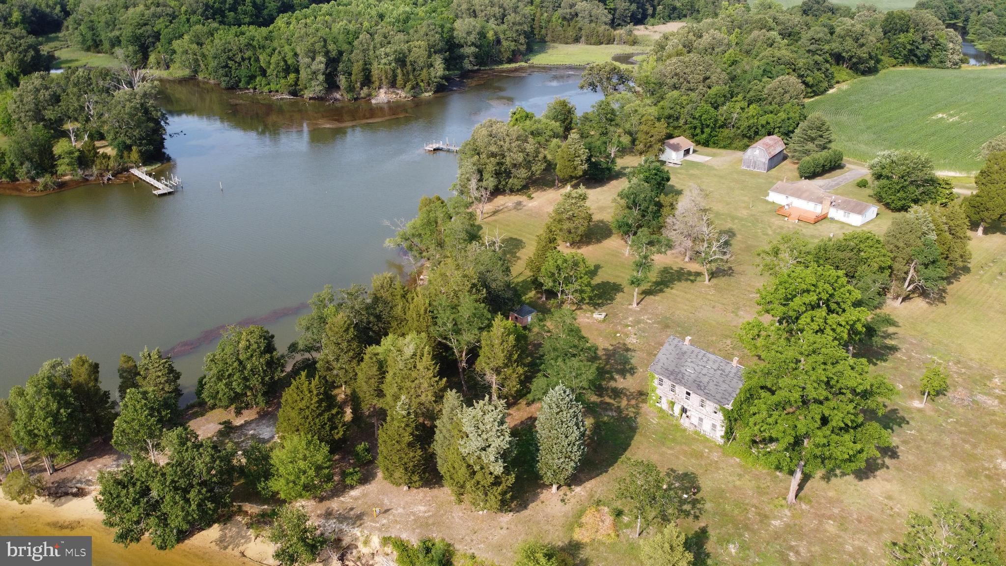 39645 Sweetpea Lane Leonardtown, MD 20650 - Photo 61 of 66 an aerial view of lake residential house with outdoor space and trees all around