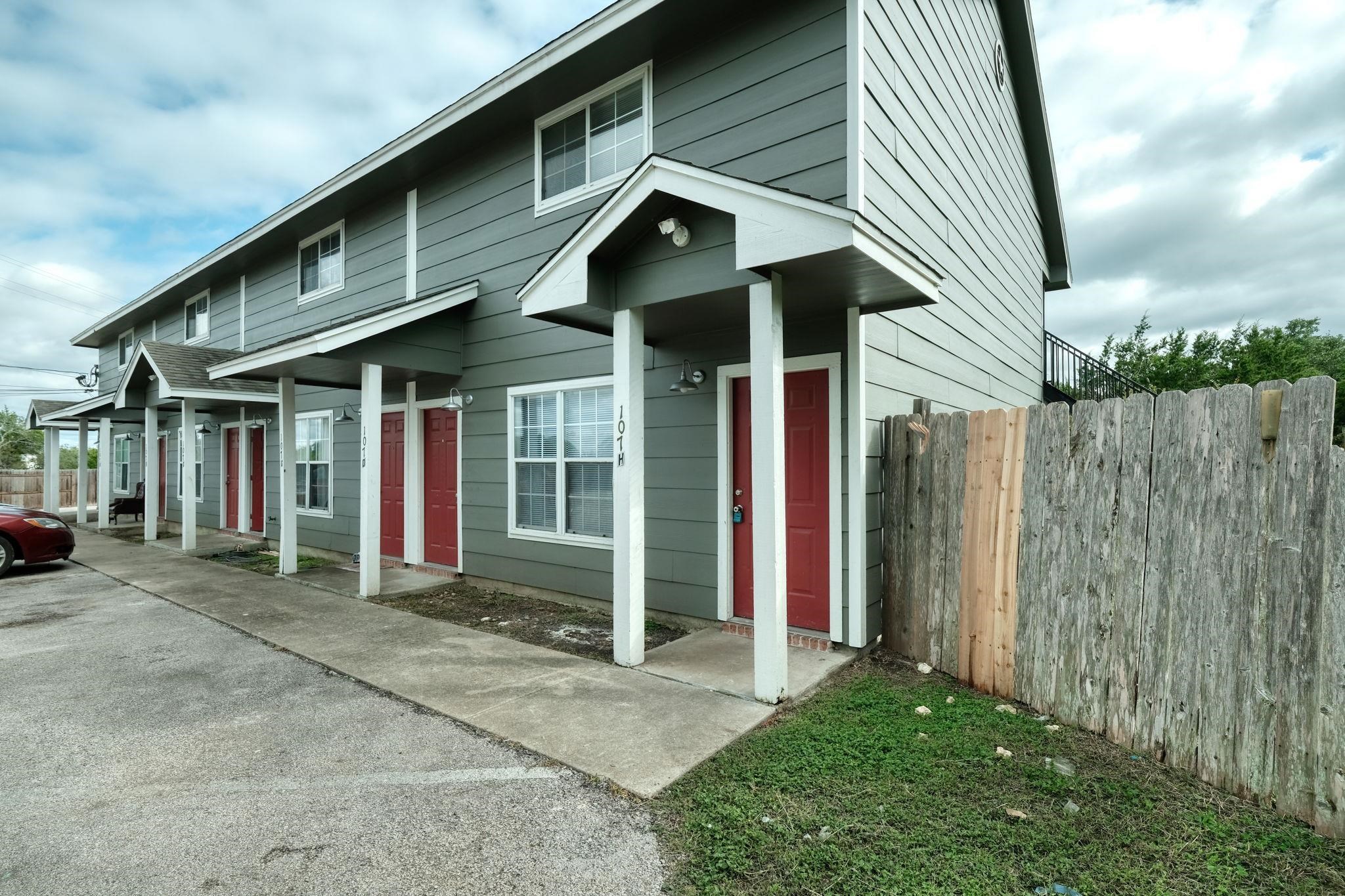 a front view of a house with a porch