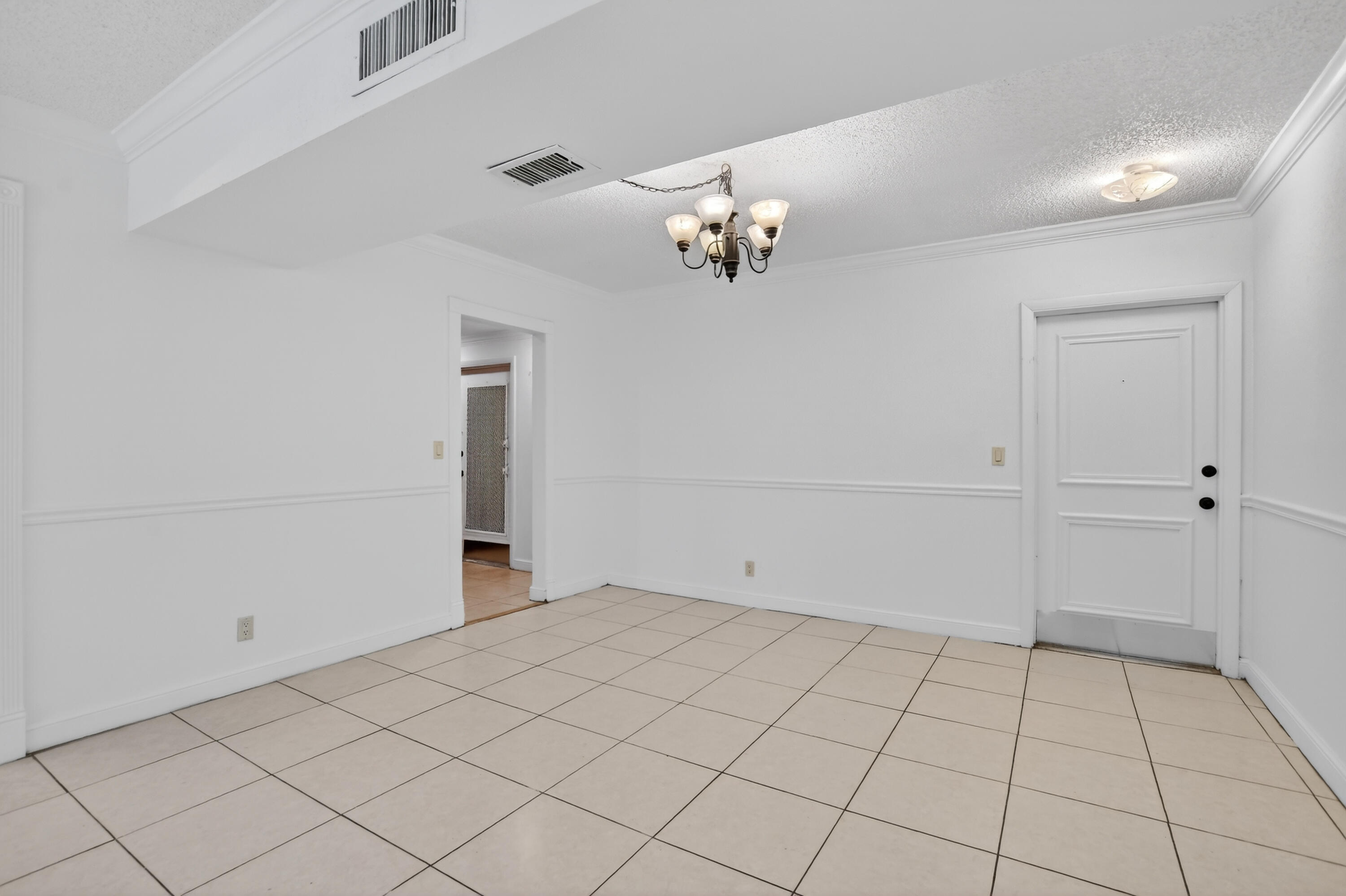 636 Northwest 13th Street, Unit 110 Boca Raton, FL 33486 - Photo 4 of 35 a view of an empty room