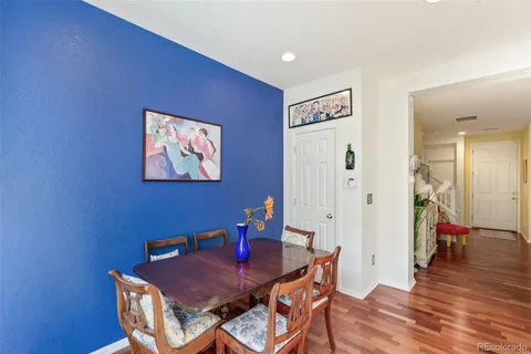 a view of a livingroom with furniture and wooden floor