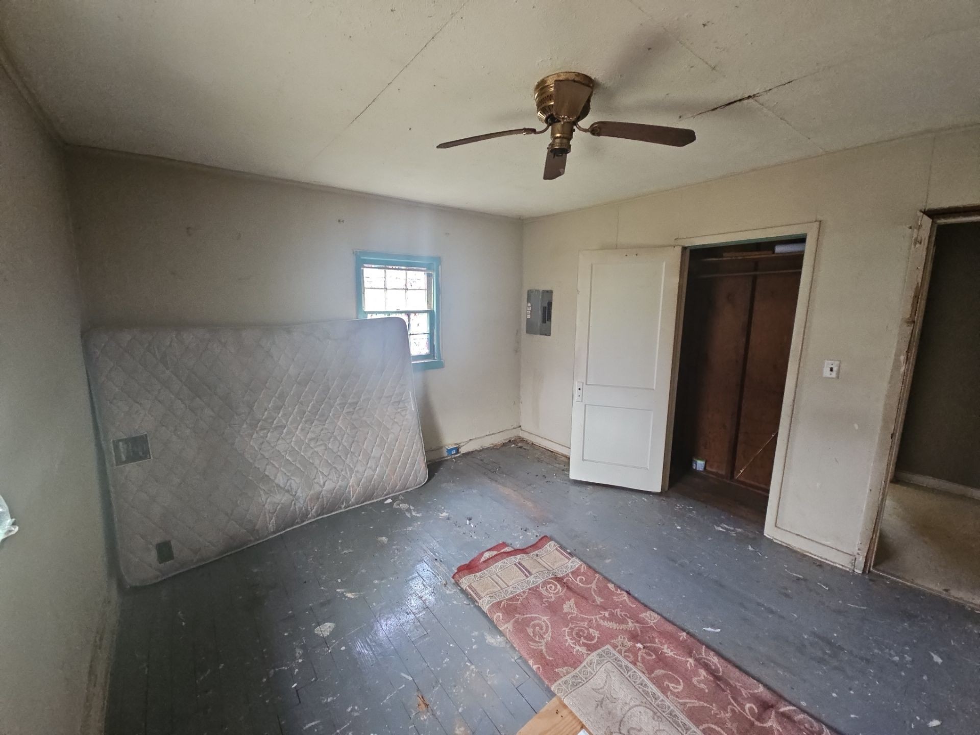 35 Loop Road Jackson, TN 38301 - Photo 8 of 10 wooden floor in an empty room with a window