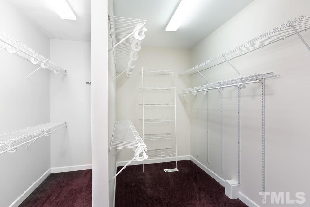 4401 Irene Way Raleigh, NC 27603 - Photo 10 of 30 Huge walk in closet with shelving.