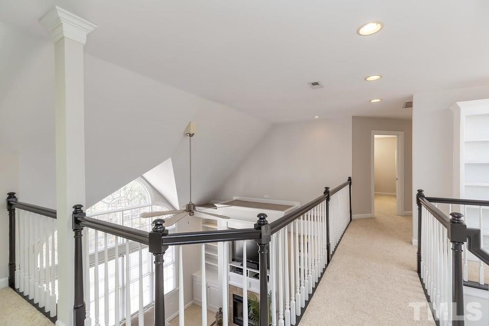 4401 Irene Way Raleigh, NC 27603 - Photo 12 of 30 Sweeping views from Mezzanine balcony overlooking Family Room and Foyer.