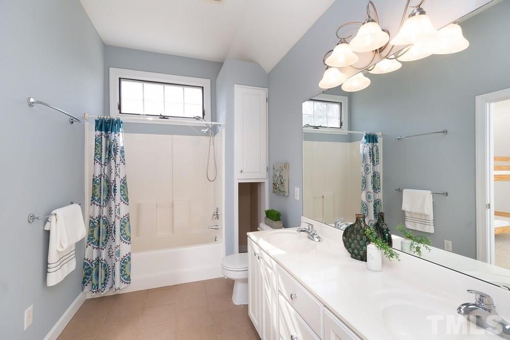 4401 Irene Way Raleigh, NC 27603 - Photo 14 of 30 Full tub/shower bath w/double sinks on second floor.