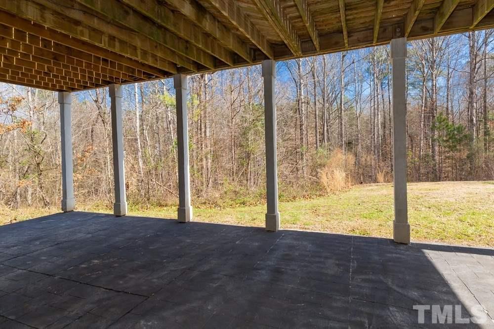 4401 Irene Way Raleigh, NC 27603 - Photo 24 of 30 Lower Level Deck off of daylight basement.