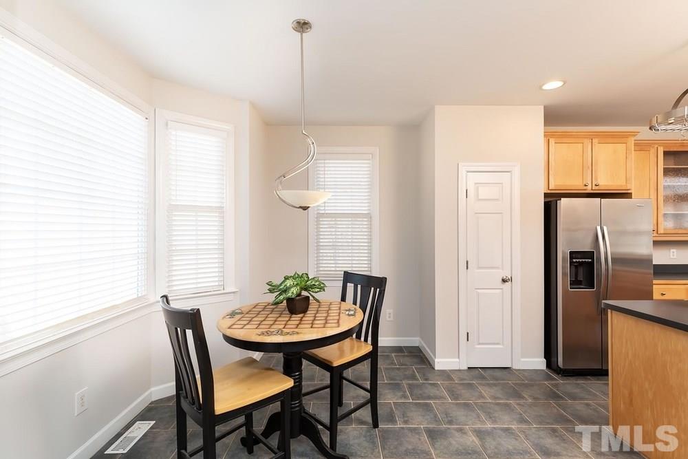 4401 Irene Way Raleigh, NC 27603 - Photo 6 of 30 Bay window breakfast nook and pantry.