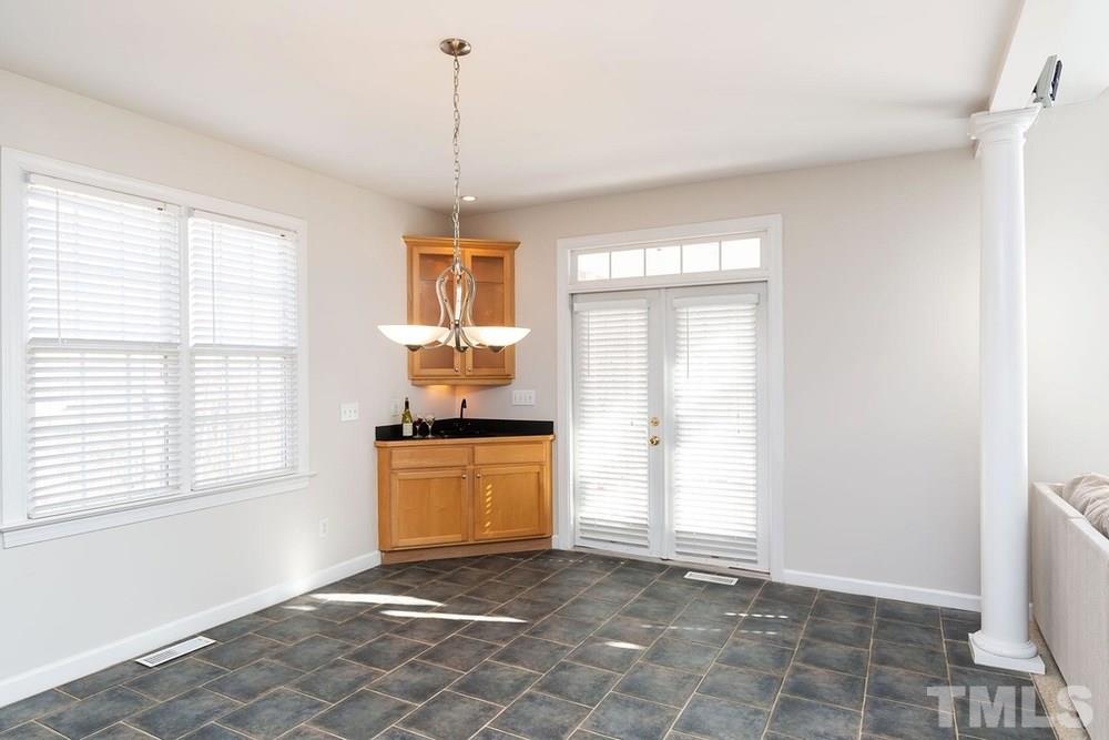 4401 Irene Way Raleigh, NC 27603 - Photo 7 of 30 Spacious Dining Room w/built in bar and access to Screen Porch. Great for entertaining!