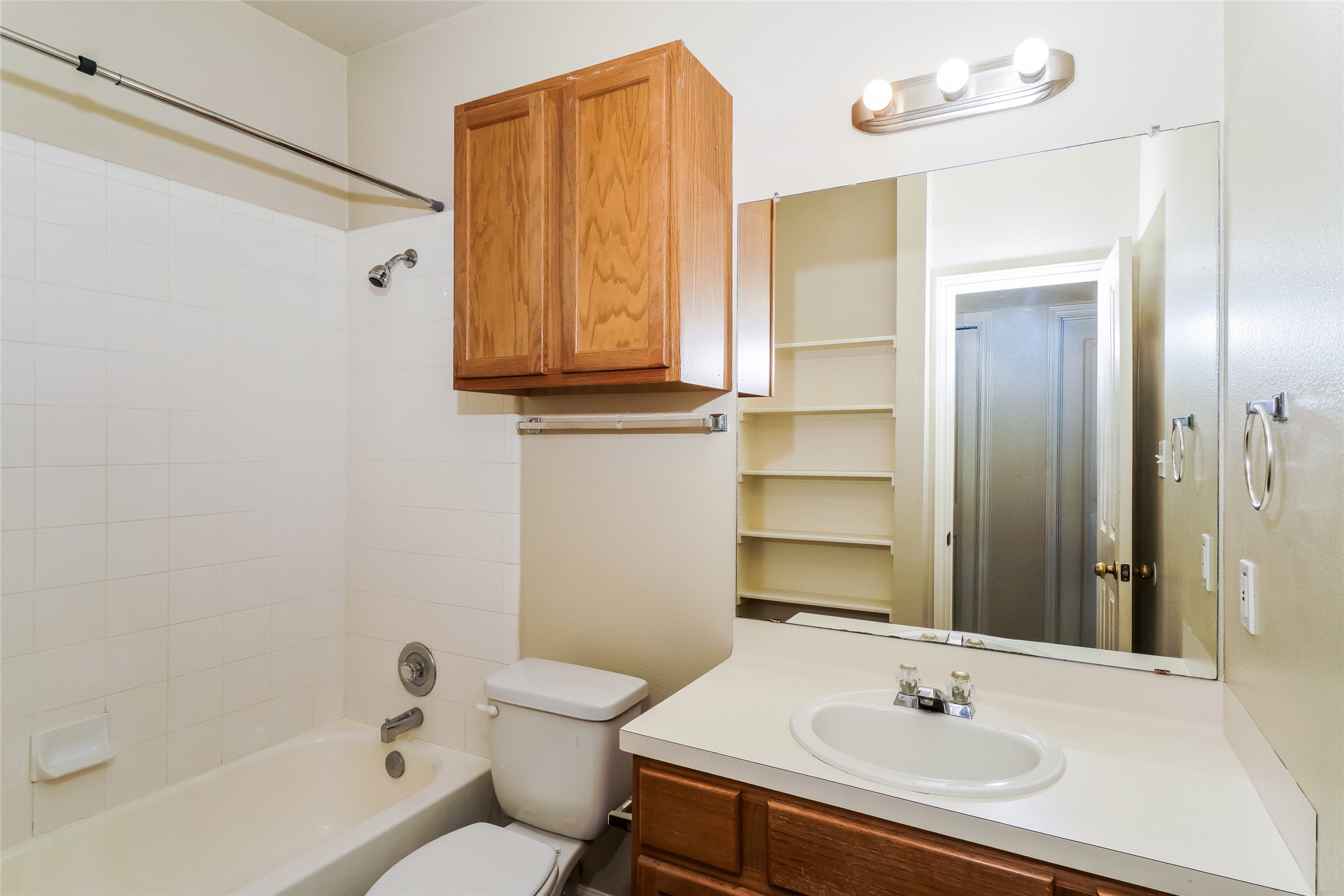 2403 Curry Loop Round Rock, TX 78664 - Photo 14 of 16 Full bath with washtub / shower combination and vanity